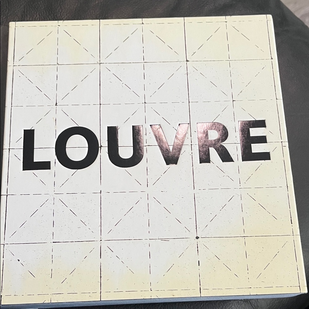 Cream and Black Decorative Book